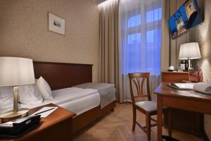 Postel nebo postele na pokoji v ubytování Hotel Rott