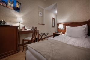 Postel nebo postele na pokoji v ubytování Hotel Rott