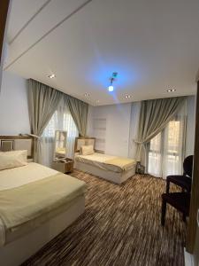 Voodi või voodid majutusasutuse Royal Suite toas