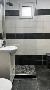 Koupelna v ubytování Astra Urban Leaf