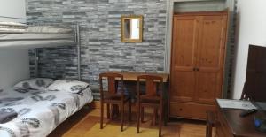 Postel nebo postele na pokoji v ubytování Appartements au bord de la rivière