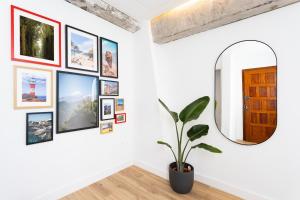 Μια τηλεόραση ή/και κέντρο ψυχαγωγίας στο Suites Rooms La Rosa