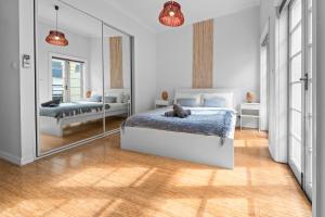 Ένα ή περισσότερα κρεβάτια σε δωμάτιο στο 3-Bedroom House in Ultimo Good for 10 Guests