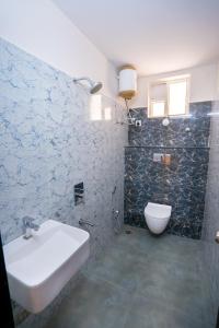 Koupelna v ubytování Golden Crest Service Apartments