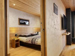 Postel nebo postele na pokoji v ubytování Magnifique appartement neuf avec grande terrasse et parking, Plagne 1800 - FR-1-455-160