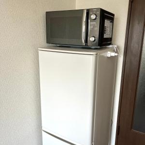 Kuchyň nebo kuchyňský kout v ubytování Guest House Loyal HAKATA