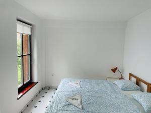 Postel nebo postele na pokoji v ubytování Residence Meljska