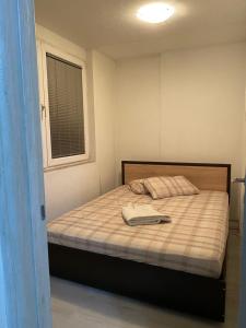 Katil atau katil-katil dalam bilik di Marie apartments
