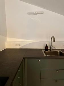 Kuchyň nebo kuchyňský kout v ubytování Wallerei Walchensee