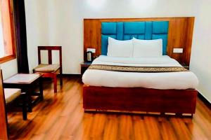 Voodi või voodid majutusasutuse The Boho Shimla toas