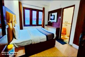 Voodi või voodid majutusasutuse The Boho Shimla toas