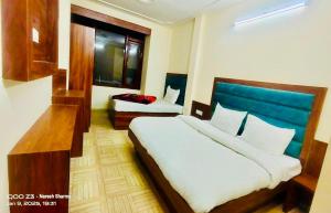 Voodi või voodid majutusasutuse The Boho Shimla toas