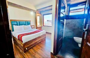 Voodi või voodid majutusasutuse The Boho Shimla toas