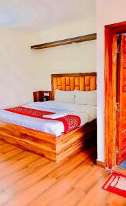 Voodi või voodid majutusasutuse The Boho Shimla toas