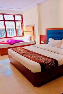 Voodi või voodid majutusasutuse The Boho Shimla toas