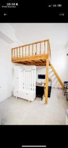 Μία ή περισσότερες κουκέτες σε δωμάτιο στο Appartement Acote de paris ou Disney