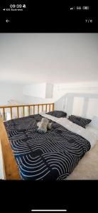 Ένα ή περισσότερα κρεβάτια σε δωμάτιο στο Appartement Acote de paris ou Disney