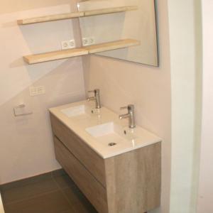 a bathroom with a sink and a mirror at Presciosa Villa Jupiter SOLO FAMILIAS in Cambrils
