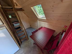 Ένα ή περισσότερα κρεβάτια σε δωμάτιο στο Air de Camping - Chemin de Traverse