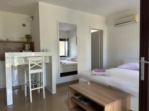 Ein Bett oder Betten in einem Zimmer der Unterkunft Villa Beba - Apartments