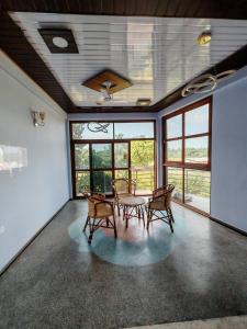 Posezení v ubytování Marutham Farm House