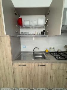 Kuchyňa alebo kuchynka v ubytovaní La Veranda