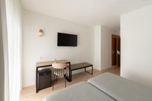 TV a/nebo společenská místnost v ubytování Hotel RH Sol