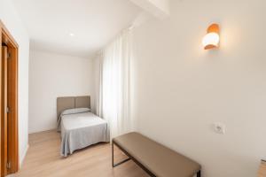 Postel nebo postele na pokoji v ubytování Hotel RH Sol