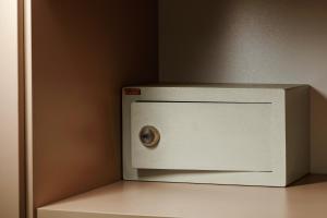 a white microwave oven sitting on top of a counter at Hotel Superior Prague in Prague