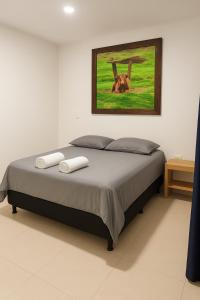 Ένα ή περισσότερα κρεβάτια σε δωμάτιο στο Hermoso Apartamento Amoblado +25 φωτογραφίες