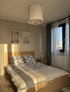 Postel nebo postele na pokoji v ubytování Morska Ostoja Chłapowo + 13 fotografií