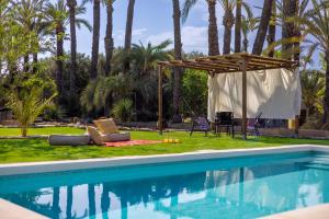 Bazén v ubytování Historical Palms Villa by Fidalsa nebo v jeho okolí