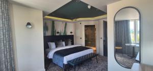 Postel nebo postele na pokoji v ubytování Hotel67