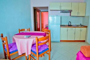 Kuchyň nebo kuchyňský kout v ubytování Apartments Alać