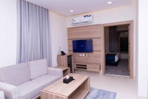Televisyen dan/atau pusat hiburan di فندق نجمة مارينا Marina Star Hotel