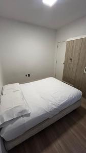 Postel nebo postele na pokoji v ubytování Apartamento à 100 metros do mar - Meia Praia