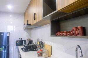 Kuchyň nebo kuchyňský kout v ubytování Raba properties