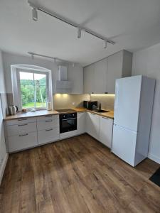 Køkken eller tekøkken på Apartament na Jasnej