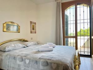 Postel nebo postele na pokoji v ubytování Villa con piscina e palestra a Rimini + 40 fotografií