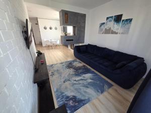 Posezení v ubytování Amira Apartament + 18 fotografií