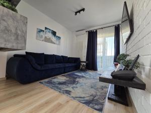 Posezení v ubytování Amira Apartament