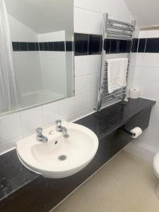 Koupelna v ubytování Chase Hotel