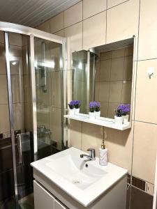 Ένα μπάνιο στο Nest Apartments - City Center