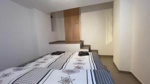 Postel nebo postele na pokoji v ubytování Ferienwohnung Slavica Dorfstrasse 94 Randa