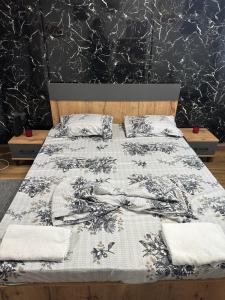 Ένα ή περισσότερα κρεβάτια σε δωμάτιο στο Nest Apartments - City Center