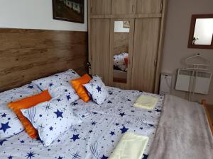 Postel nebo postele na pokoji v ubytování Kertész Vendégház