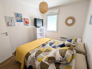 Photo de la galerie de l'établissement T2 en rez-de-jardin proche Vannes - Parking - Calme, à Ploeren