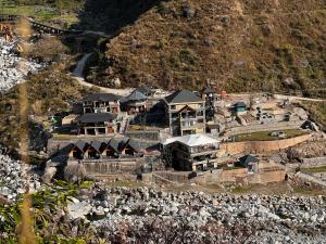 an aerial view of a house on a mountain at Himani Hill View Retreat in Pathyar