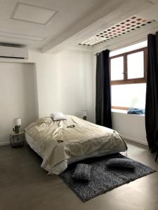 Postel nebo postele na pokoji v ubytování Atelier des Doux