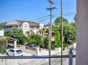 a view of a house from a balcony at Anestis Apartments in Kontokali